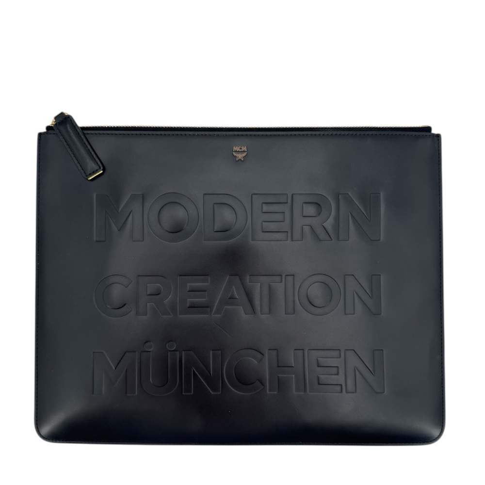 MCM (Modern Creation München) leather clutch/pouch with embossed text